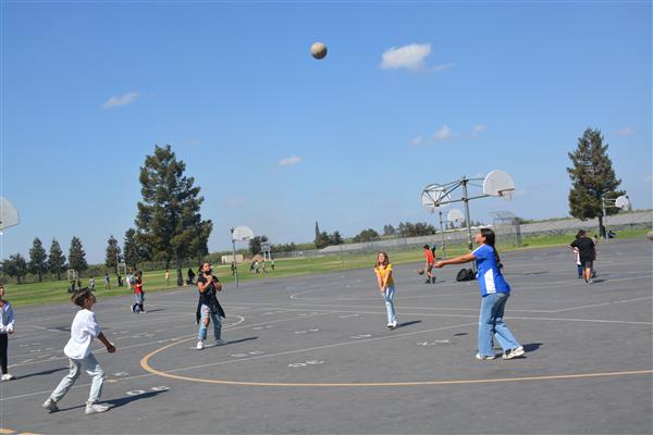 Students playing volleyball during lunch